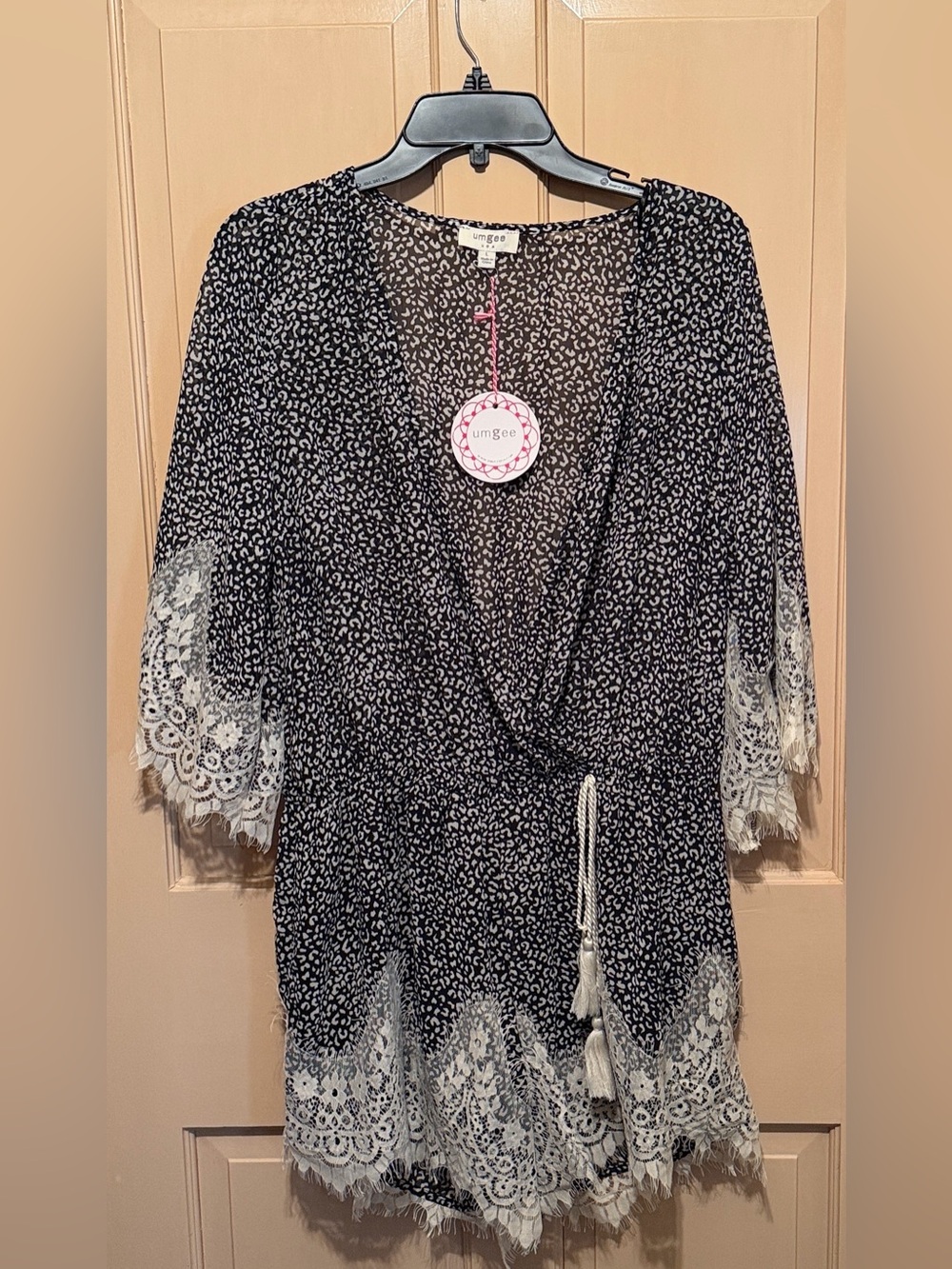Umgee Black and White Animal Romper with Logo Tag